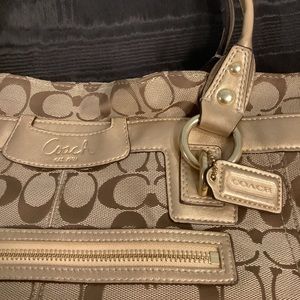 Coach handbag in beige and brown jacquard logo fabric w gold accents & handles